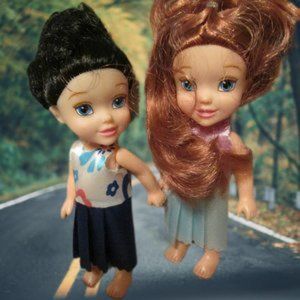 Two Cute Plastic Dolls Made In China